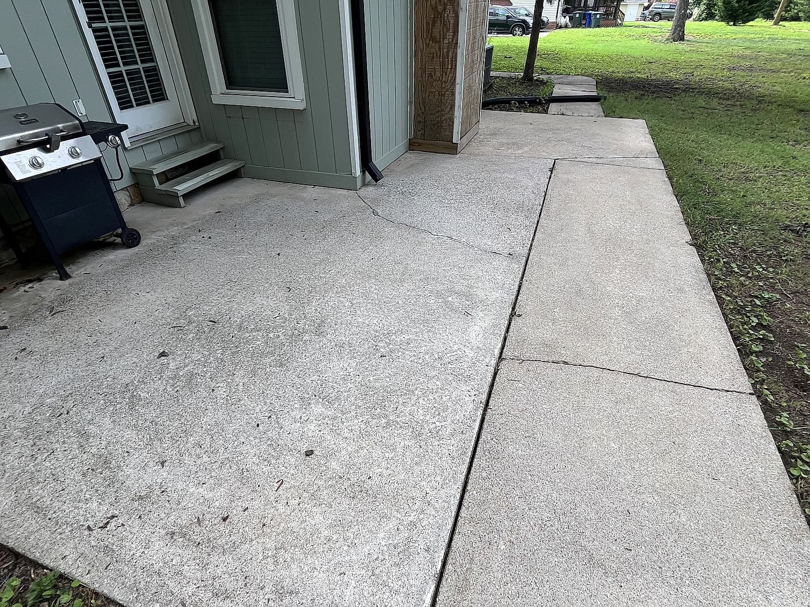 Bright, clean back patio and walkway after pressure washing