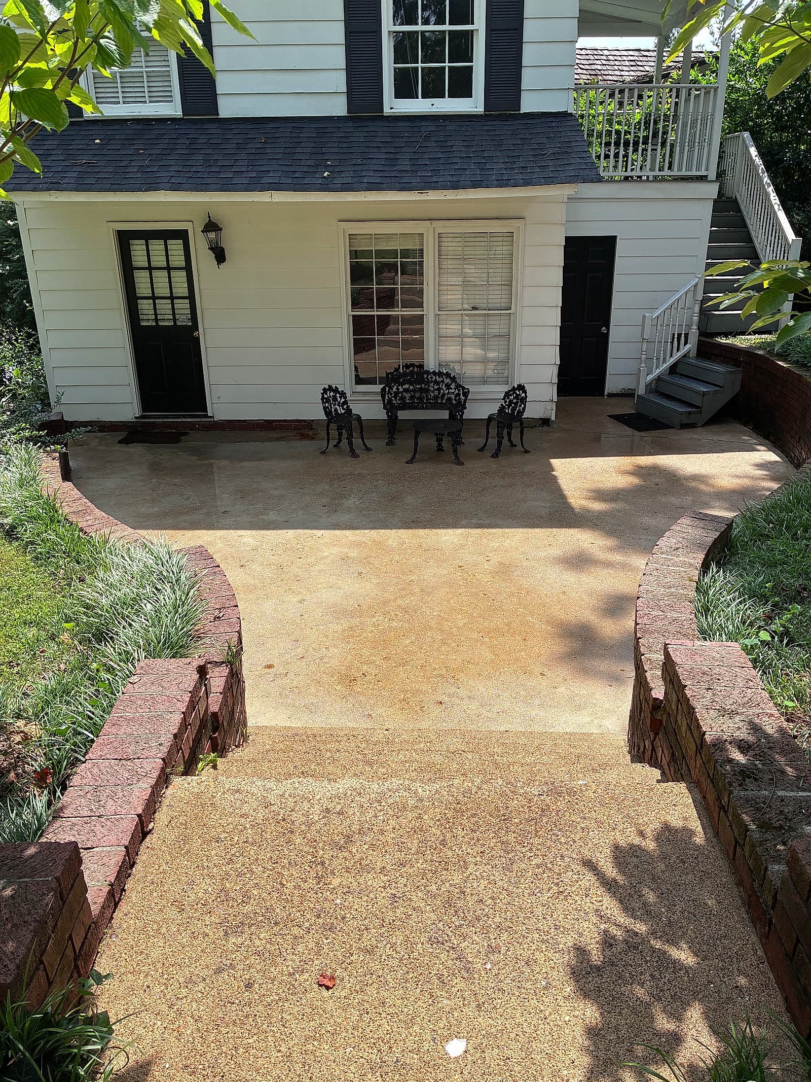 Bright, clean brick patio and steps after pressure washing